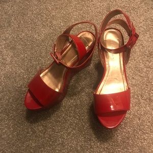 Red patent wedge sandals